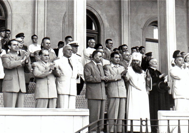 Patriarch Justinian and the Communist leadership of Romania, at the "23 August" Stadium during the opening of the World Festival of Youth and Students (1953) - foto preluat de pe en.wikipedia.org