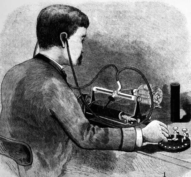 Listening to Charles Sumner Tainter's Graphophone, (January 02, 1888) - foto preluat de pe www.gettyimages.com