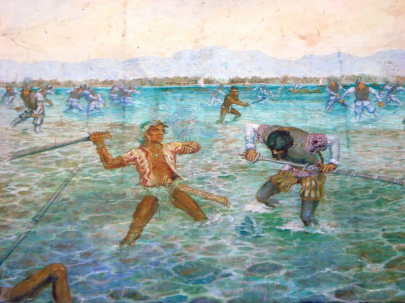 "Bătălia de la Mactan" (27 aprilie 1521) - pictură murală (Exploratorul Ferdinand Magellan este ucis de băștinașii din Filipine conduși de Lapu-Lapu) - foto preluat de ro.wikipedia.org