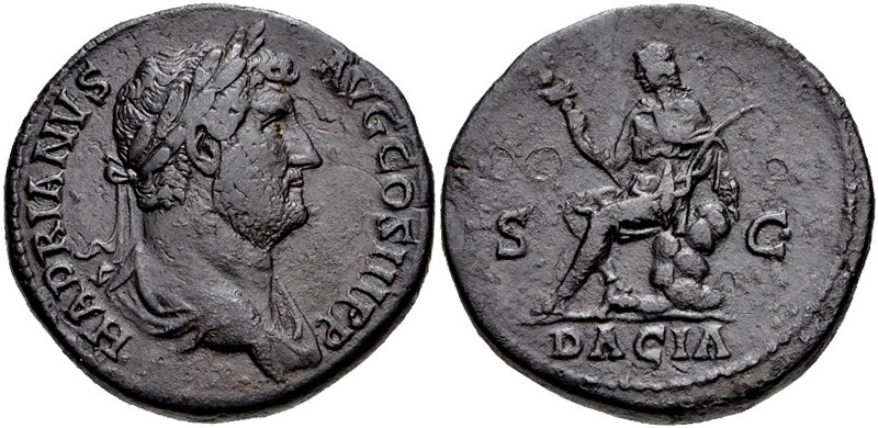 Hadrian. 117-138 d.Hr. Æ Sestertius (32mm, 25,19 g, 12h). Monetăria Romei. Lovită în jurul anilor 134-138 d.Hr. HADRIANVS AVG COS III P P, bust laureat și curias la dreapta Dacia așezată în stânga pe grămadă de stâncă, ținând în mână vexillum și sabie curbată; DACIA in exerga. RIC II 849; Banti 237 - foto preluat de pe ro.wikipedia.org