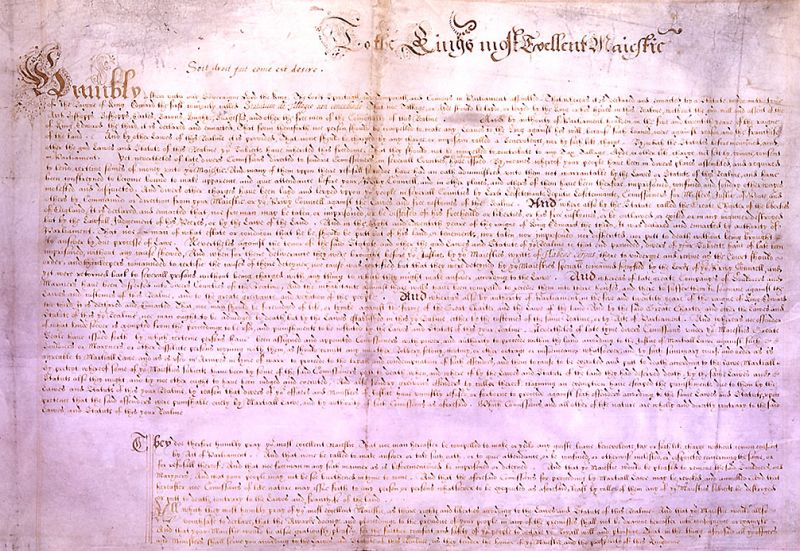 Un document istoric oficial de mari dimensiuni pe pergament deschis la culoare, scris integral de mână cu o caligrafie englezească densă și elegantă, având titlul principal mărit în partea superioară.