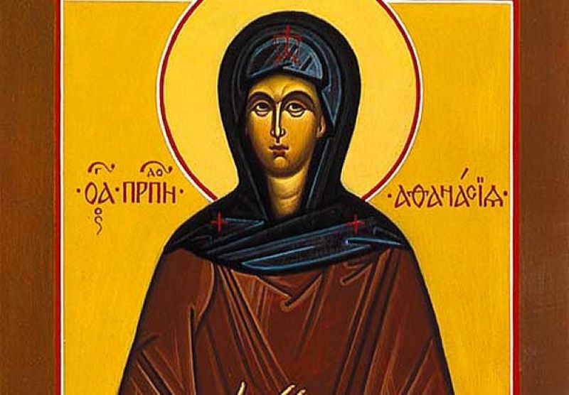 Icoană ortodoxă a Sfintei Cuvioase Atanasia de la Eghina, reprezentată în haine monahale, simbolizând smerenia și verticalitatea spirituală.